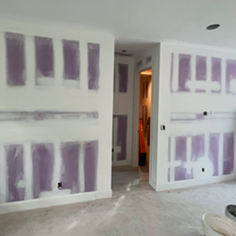 Drywall repair and skim coat